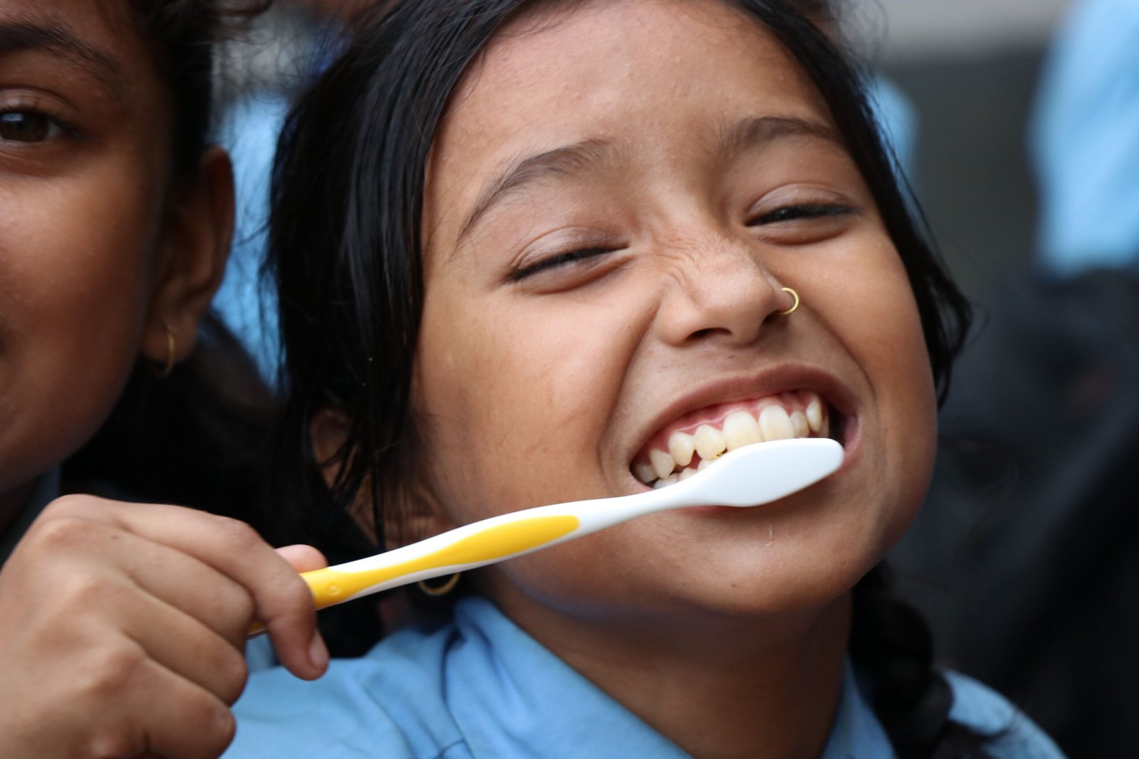 Young Indian girl practising daily brushing for a healthier smile